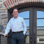 Dr. Keith Ryan outside his Tulsa, Oklahoma Chiropractic Clinic.