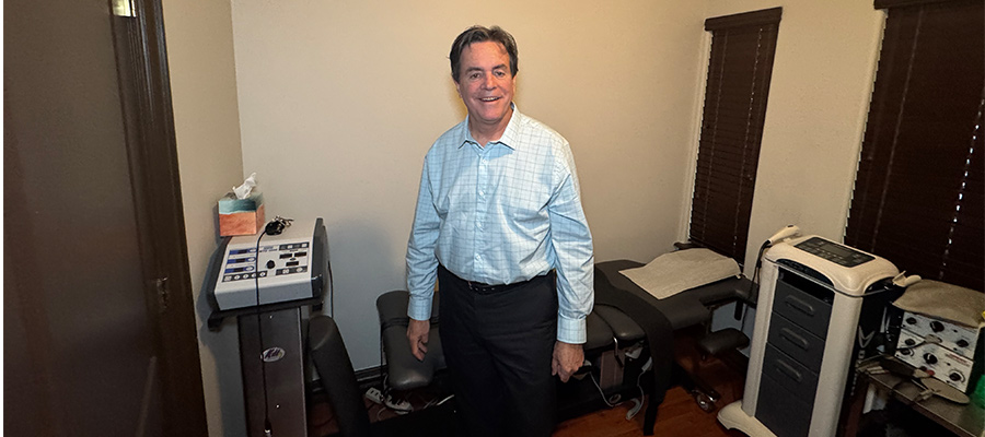 Dr Keith Ryan in his Spinal Decompression treatment room in Tulsa OK