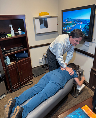 Patient Getting a Chiropractic Adjustment from Dr. Keith Ryan in Tulsa, OK