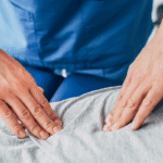 Chiropractor in Tulsa, OK providing chiropractic care to a patient.