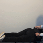Dr Keith Ryan providing spinal decompression to patient on a spinal decompression table in Tulsa, OK